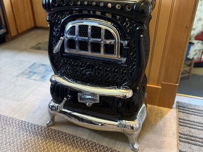 Vintage Coal Stove. Restored as a quality vintage item to give your space charm. Not usable to burn fires it’s just for looks.