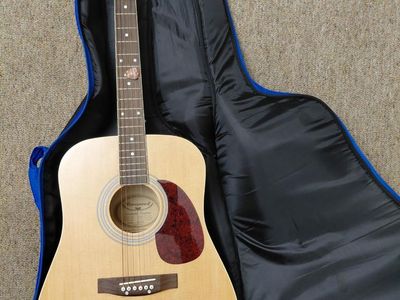 Burswood Guitar Beautiful Sound includes Case and Guitar/ Bass Auto Tuner.