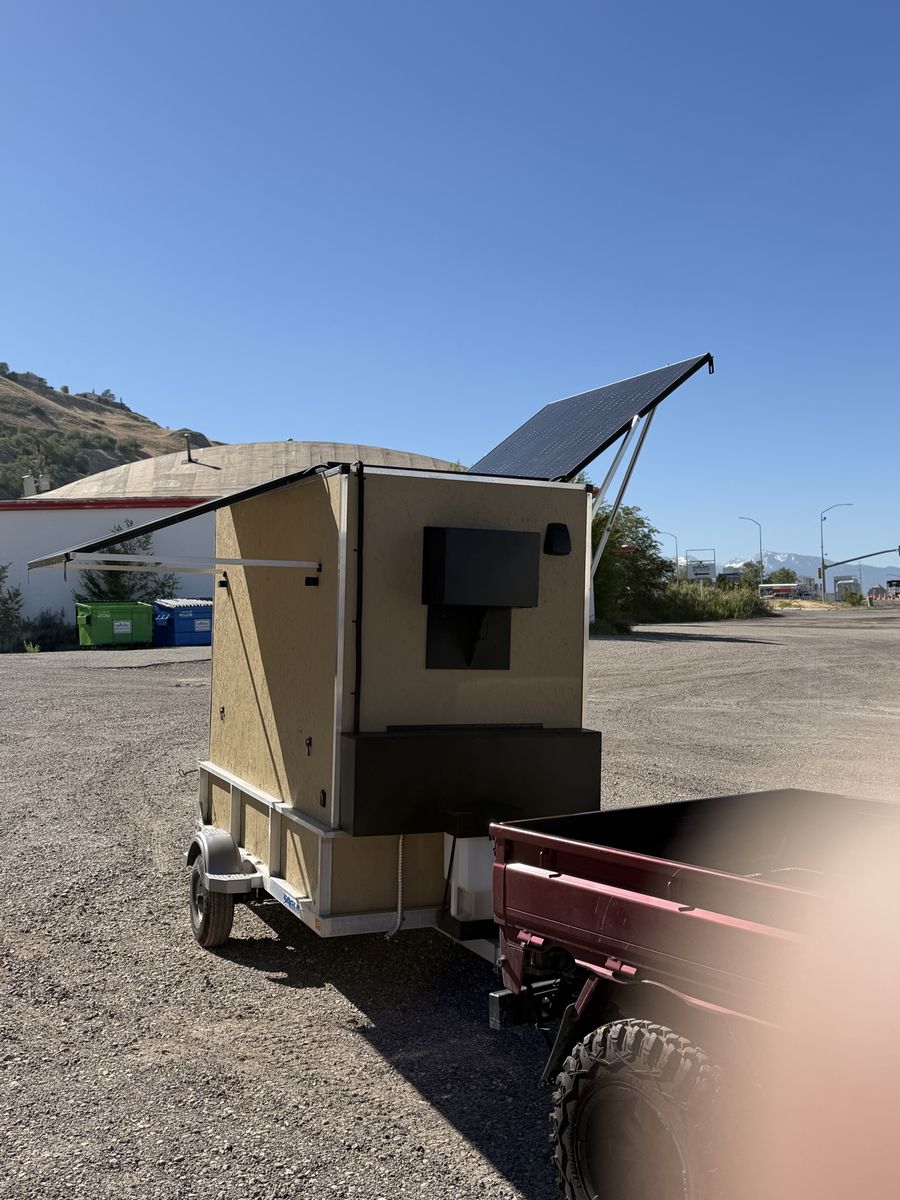 Custom eMoto trailer with solar charging system