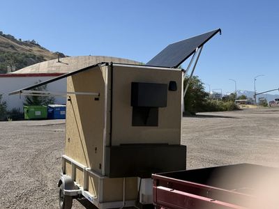 Custom eMoto trailer with solar charging system