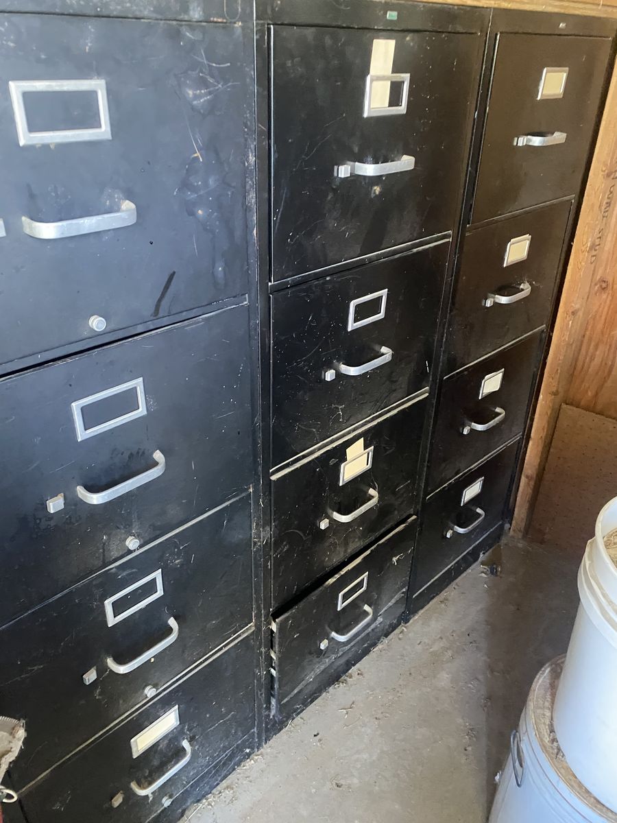 Four drawer metal filing cabinets
