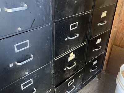 Four drawer metal filing cabinets