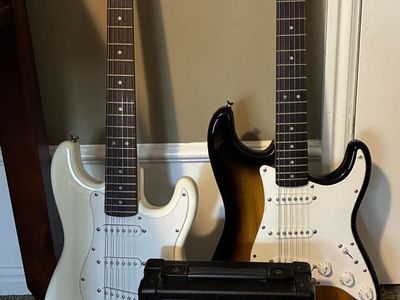 2 electric guitars and amp