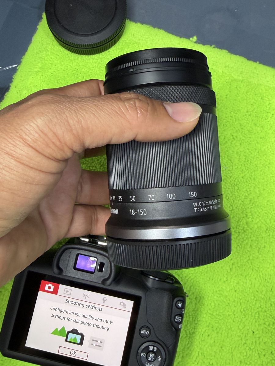 Canon R100, rfs 18-150mm new