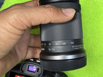 Canon R100, rfs 18-150mm new