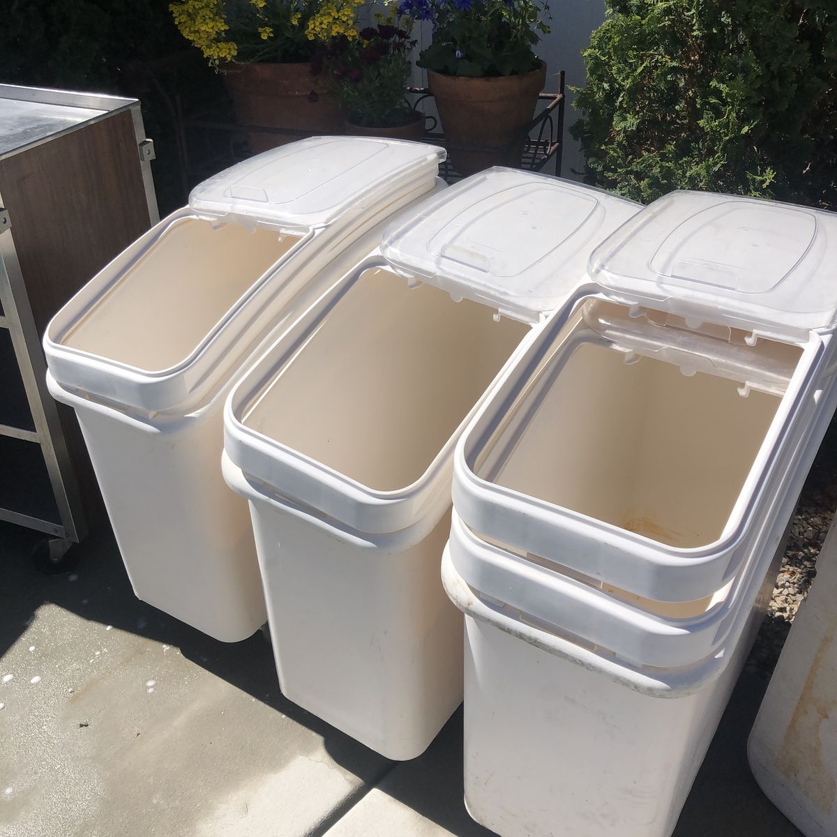 Food storage bins and stainless steel prep table and shelving