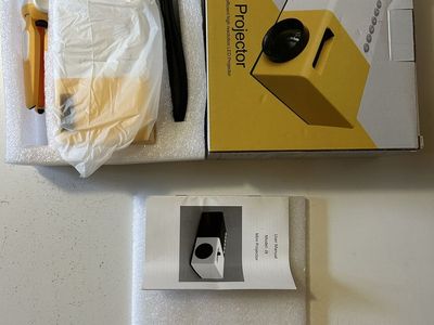 J9 Mini LED Projector Yellow and White with Accessories and Manual