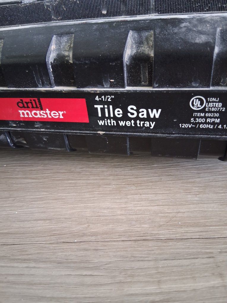 Must sell fast. Make an offer. Drill Master 4-1/2" Tile Saw with Wet Tray.