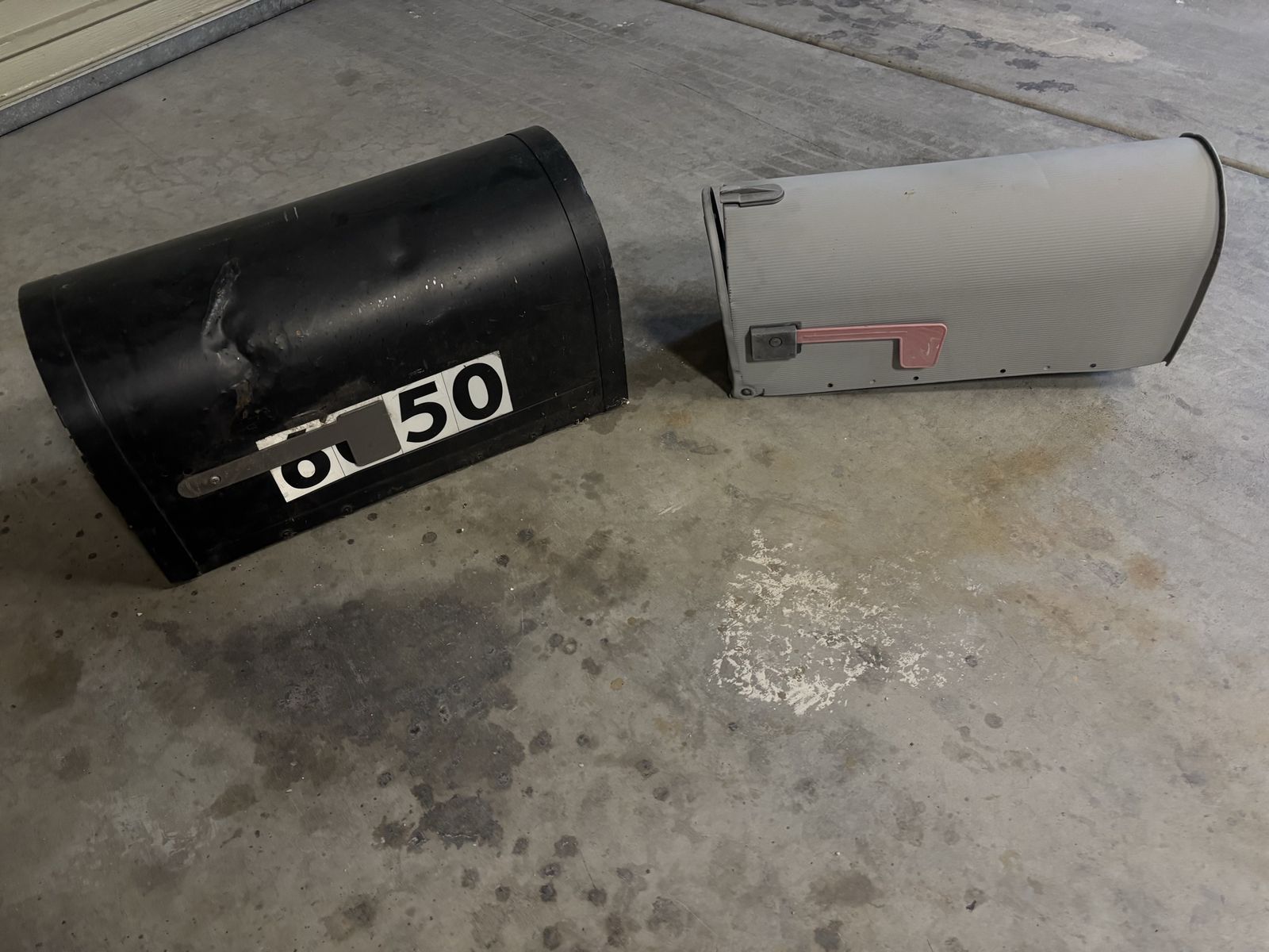 Two older mail boxes