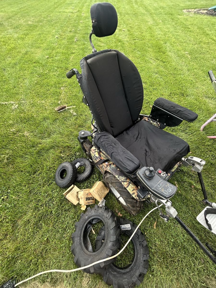 All-Terrain Motorized Power Wheelchair with Camo Body, Headrest & Spare Tires