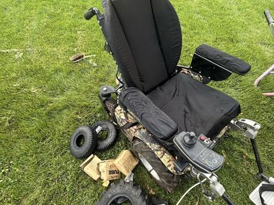 All-Terrain Motorized Power Wheelchair with Camo Body, Headrest & Spare Tires