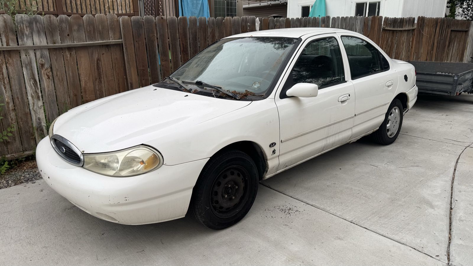 Trade 1999 Ford Contour runs and drive clean title