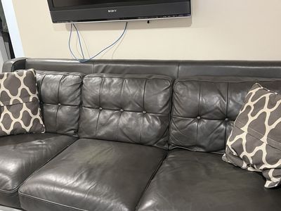 Two Cozy Gray Leather Loveseat Sofa