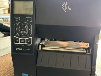 Zebra ZT230 Thermal Industrial Printer 4"| 203 DPI | | USB, Serial, Ethernet | LCD Screen| & Labels