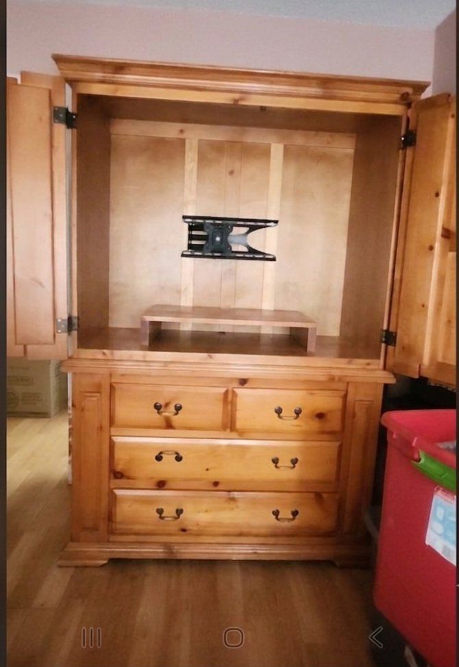 T.V with drawers and shelfs