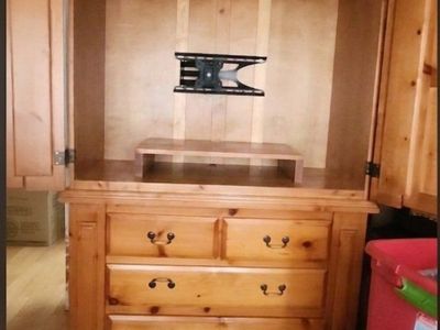 T.V with drawers and shelfs