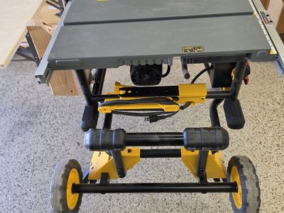 Dewalt Table Saw with Rolling Stand and Outfeed Table