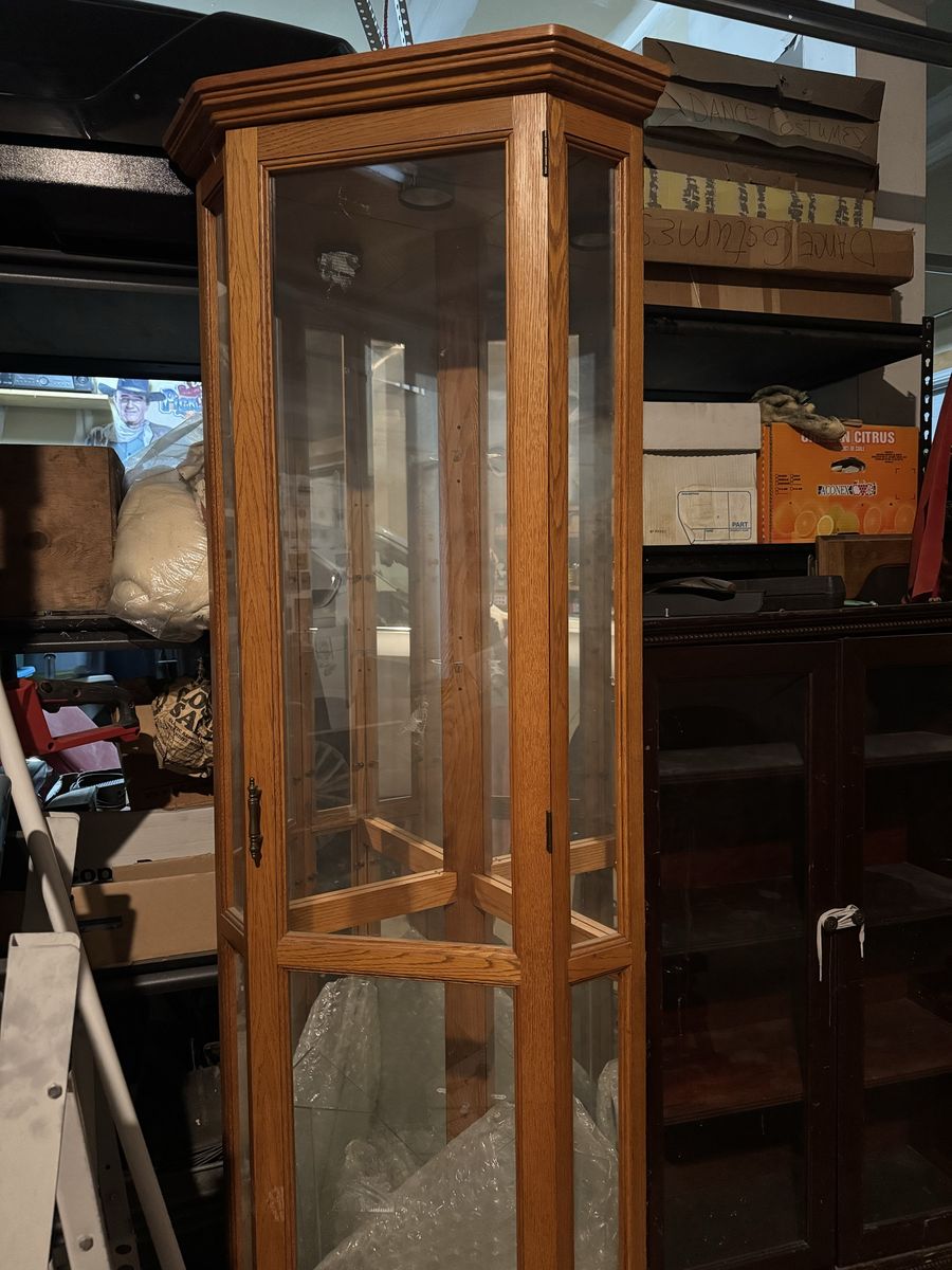 Corner curio cabinet