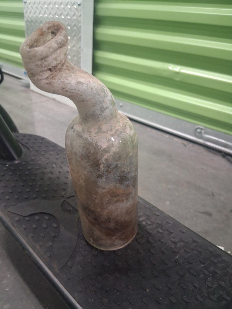 Vintage Hand-Blown Glass Bottle with Curved Neck - Rustic Decor Piece