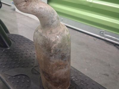 Vintage Hand-Blown Glass Bottle with Curved Neck - Rustic Decor Piece