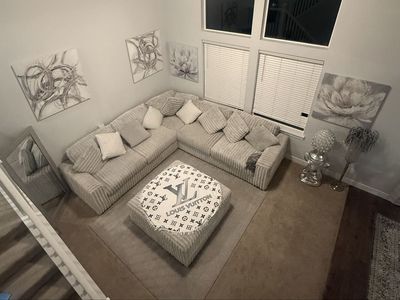 Living room set and dining table beautiful sectional and knickknacks pictures included