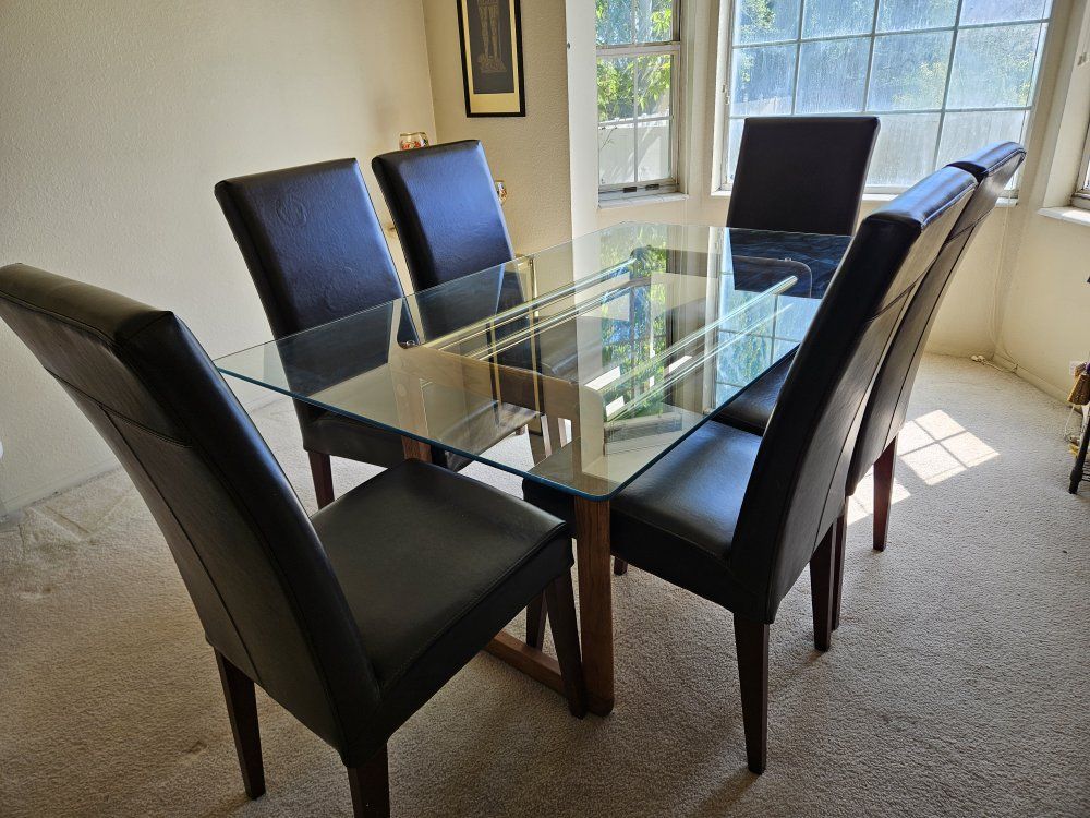 Contemporary Glass Top Dining Table with 6 Black Faux Leather Chairs - Estste Sale