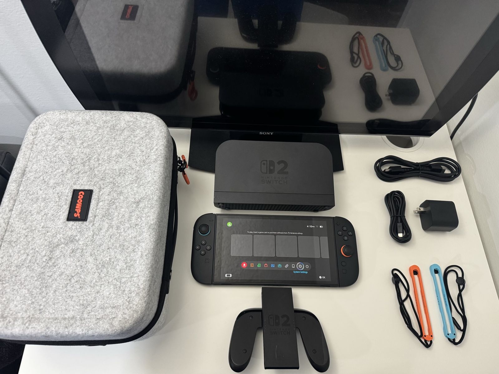 Nintendo Switch 2 / Dock / Grip / Joy Cons / Charger / HDMI Cable / Travel Case