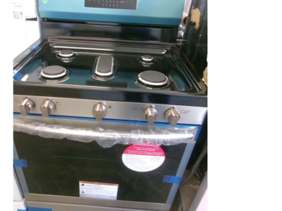Whirlpool Gas oven range with extra amenities