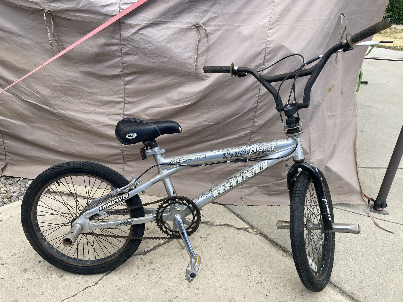 Mongoose Grind Misfit Aluminum Freestyle BMX Bike with Bell Seat