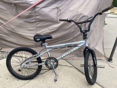 Mongoose Grind Misfit Aluminum Freestyle BMX Bike with Bell Seat
