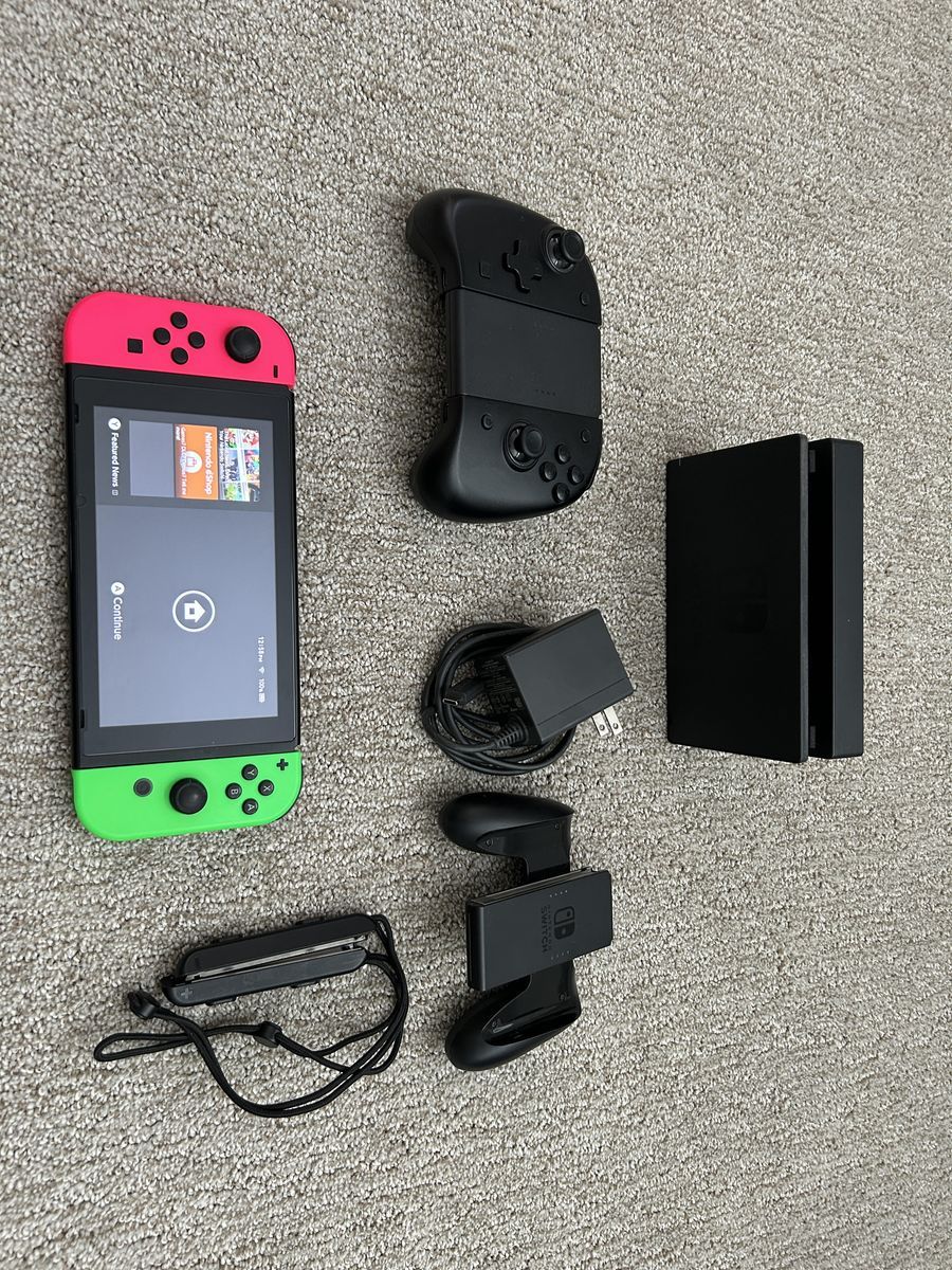 Nintendo Switch Console with Neon Joy-Cons, Dock, AC Adapter, and Grips - Excellent Condition
