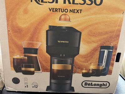 Nespresso Vertuo Next Coffee Machine by De'Longhi with Several Pods (basically new)