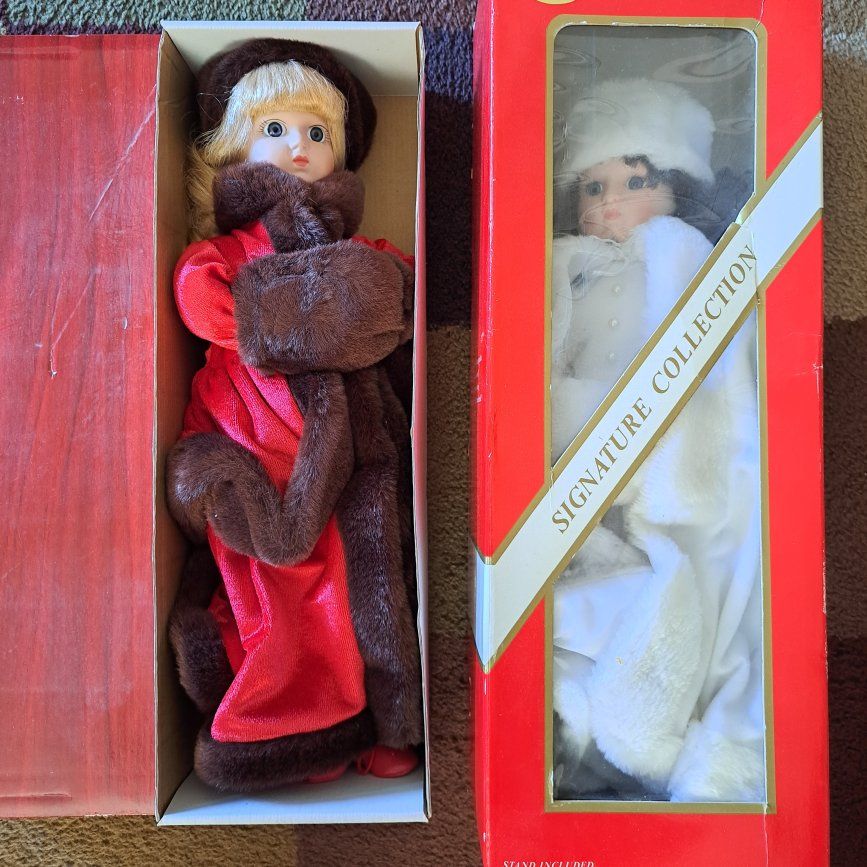 2 old porcelain dolls