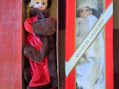 2 old porcelain dolls
