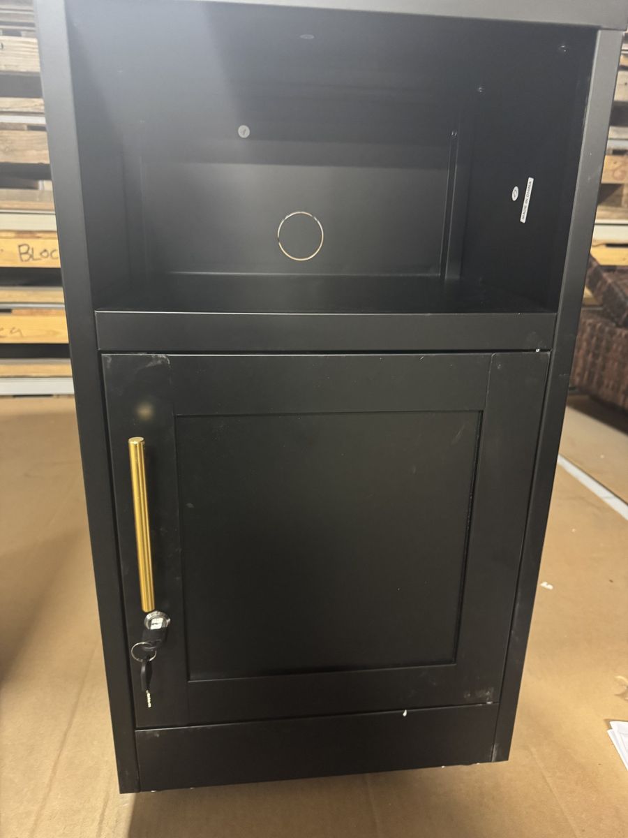Steel cabinet with locking door.