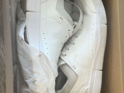 On shoes white The Roger Centre Court