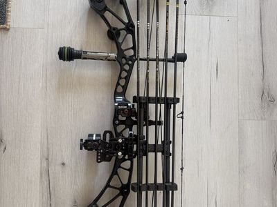 Bowtech Compound Bow Setup with Quiver, Arrows, Sight, and Stabilizer