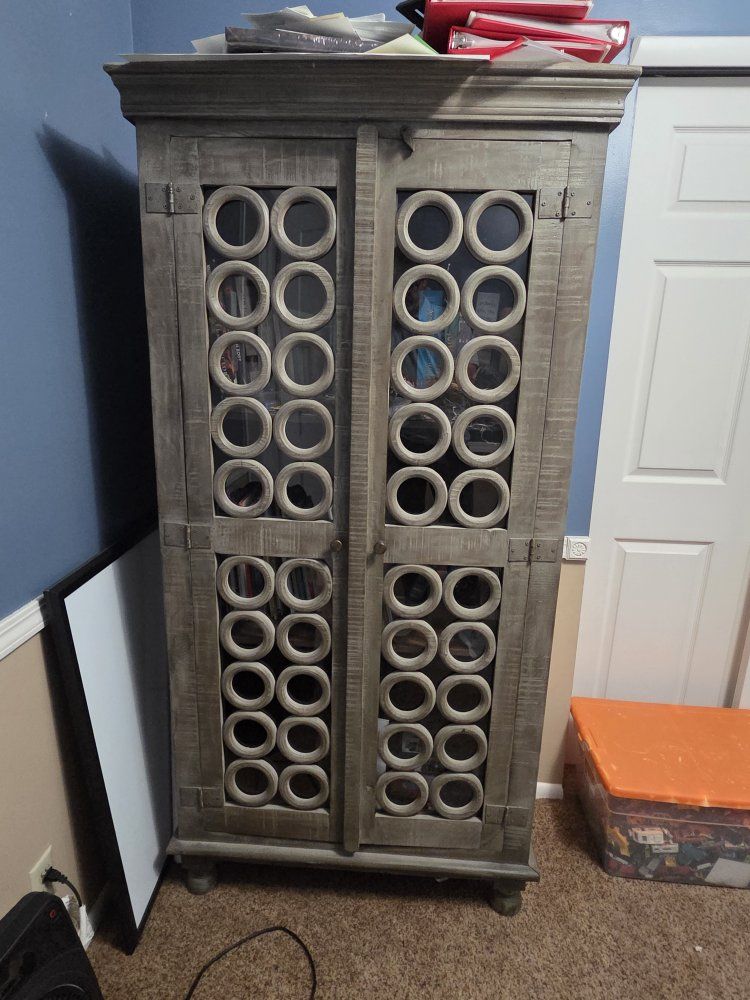 Rustic Gray Wooden Storage Cabinet with Decorative Circle Cutout Doors