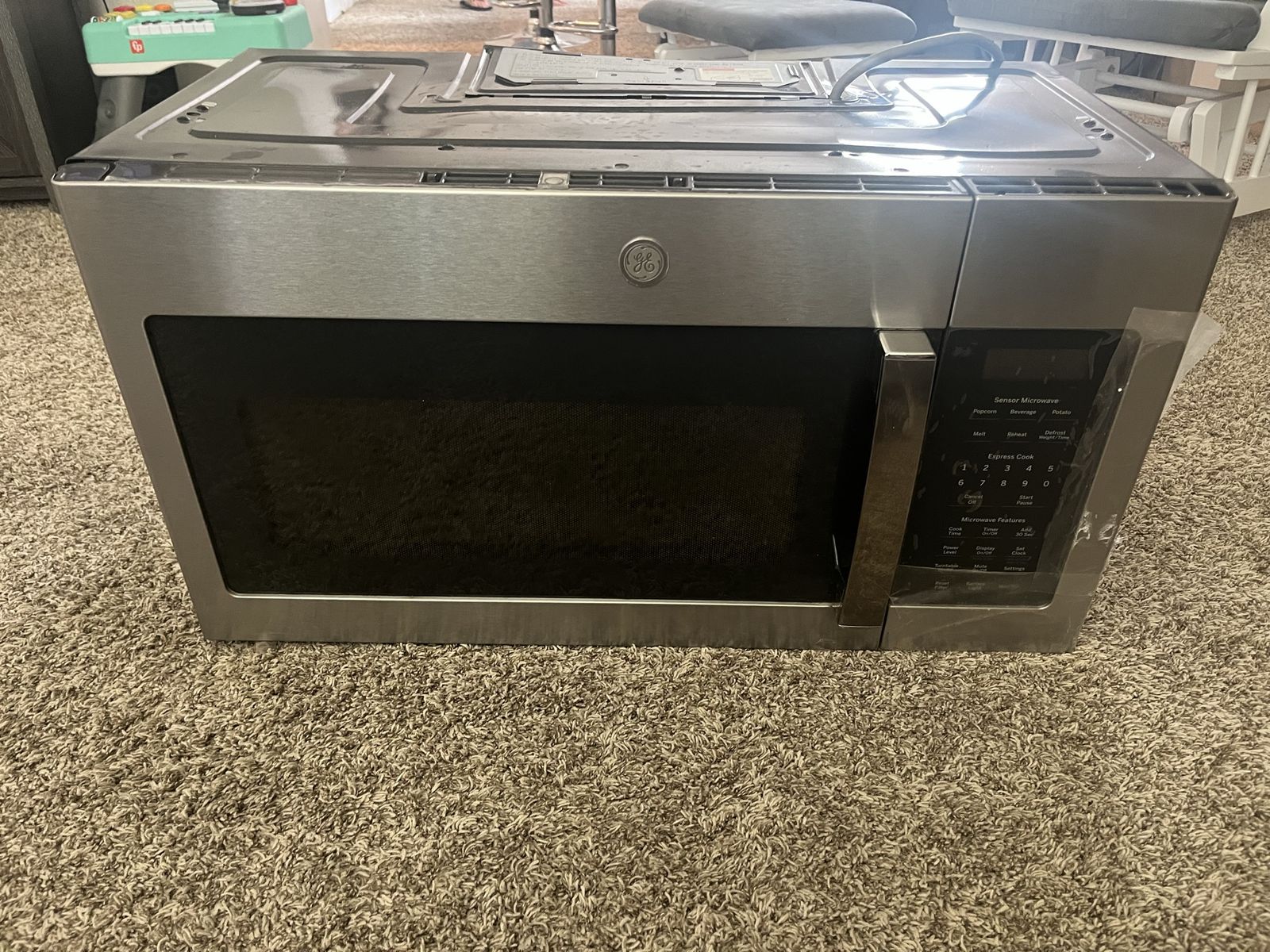 GE Stainless Steel Over-The-Range Sensor Microwave Oven