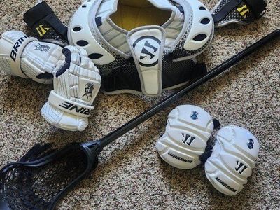 lacrosse gear (goalie pads?)