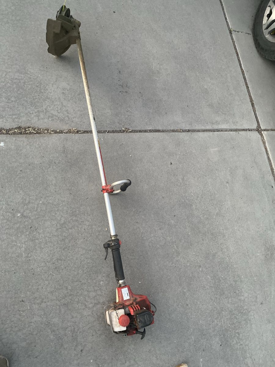 Red Gas-Powered String Trimmer/Weed Wacker for Lawn Care - Used Condition