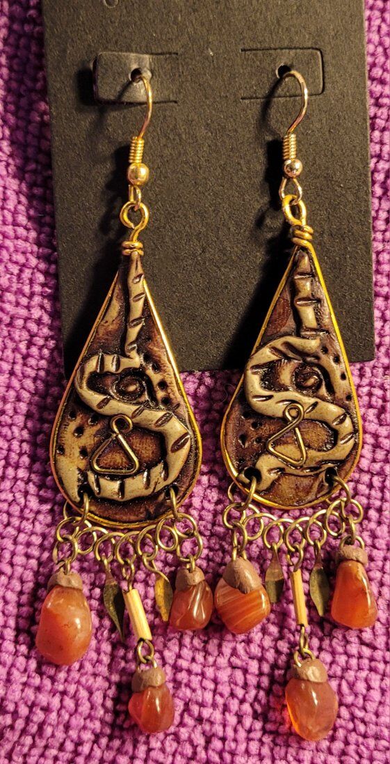 Vintage pair of artisan gold-tone dangle earrings