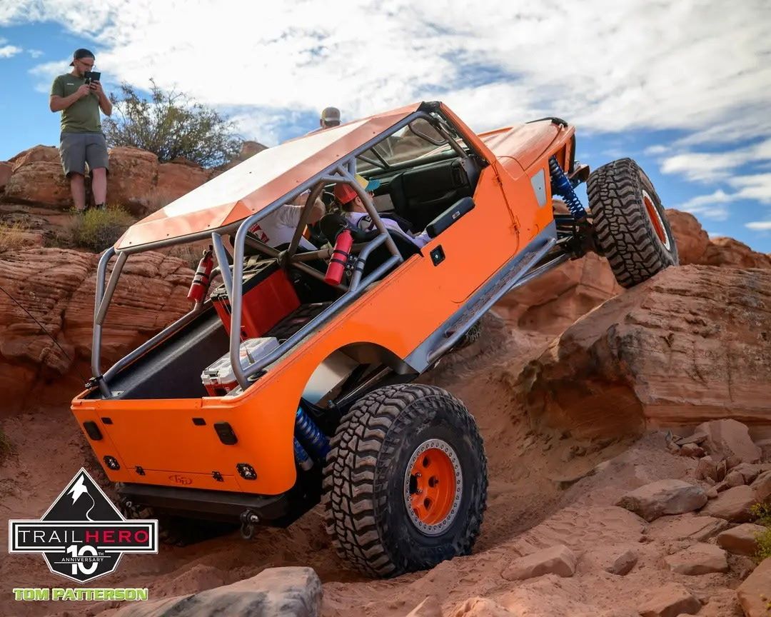 Custom Orange Gen-Right Off Road Rock Crawler Jeep Built for Extreme Trail Performance