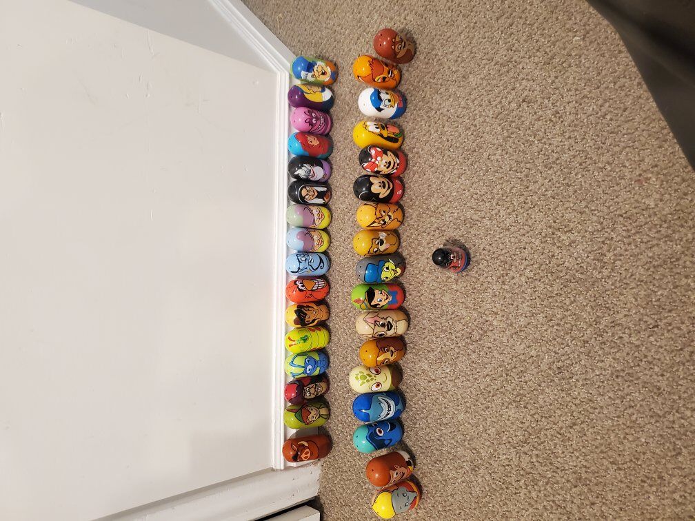 34 disney weeble wobble toys
