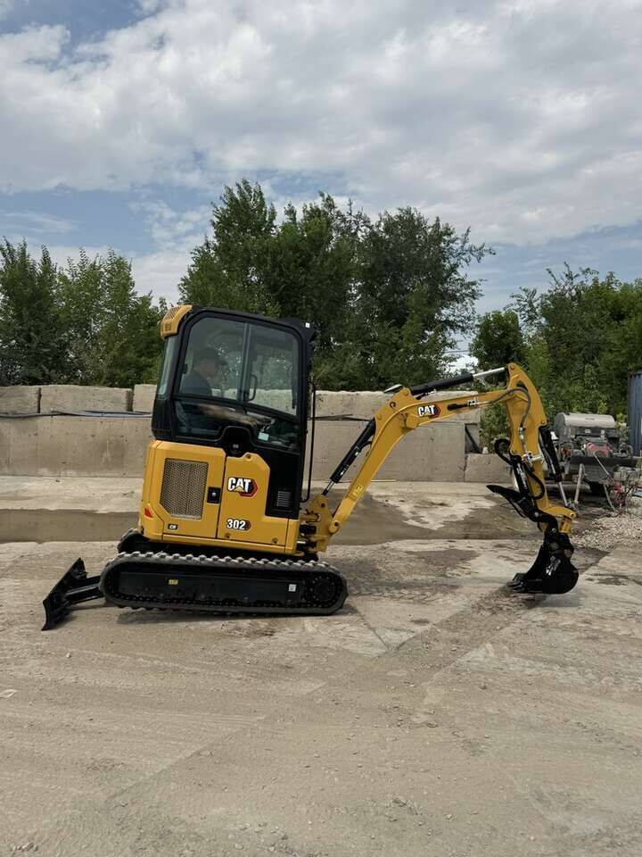 Cat 302 Mini Excavator Rental – 2 Ton Compact Excavator - Available with dump trailer or flatbed - half day available
