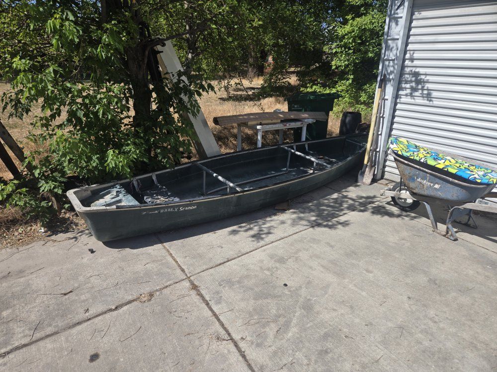 Used RAM-X Scanoe 15' Fiberglass Canoe/Boat - Durable, Green, Ready for Water