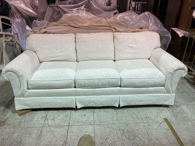 White cloth living room sofa