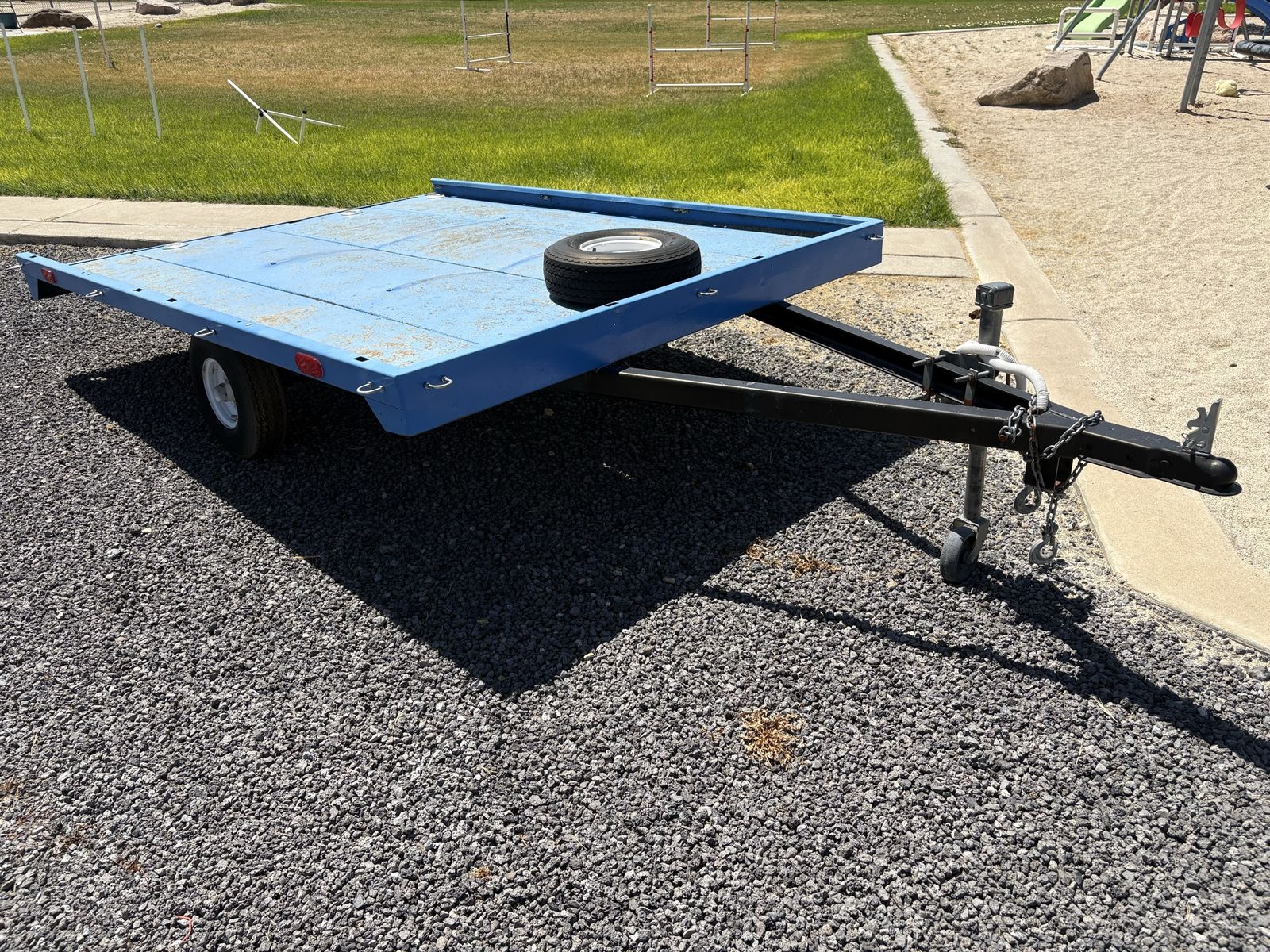Blue Utility Flatbed Trailer with Tongue Jack and Spare Tire