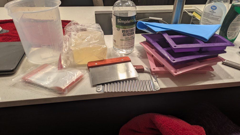 soap making things (base, molds, cutters, bags)