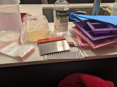 soap making things (base, molds, cutters, bags)